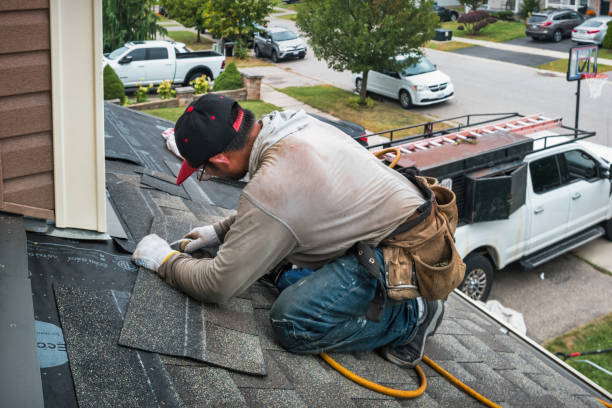 Professional Gutter Repair And Installation technician working in Montauk, NY